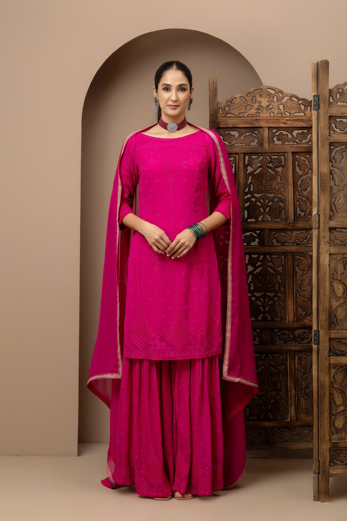 MMD/GUL/110 Boat neck georgette embroidered kurta gharara set paired with georgette dupatta with aari border..