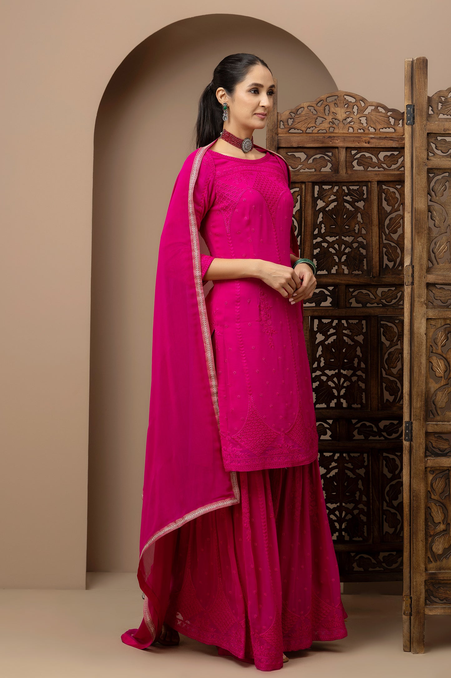 MMD/GUL/110 Boat neck georgette embroidered kurta gharara set paired with georgette dupatta with aari border..