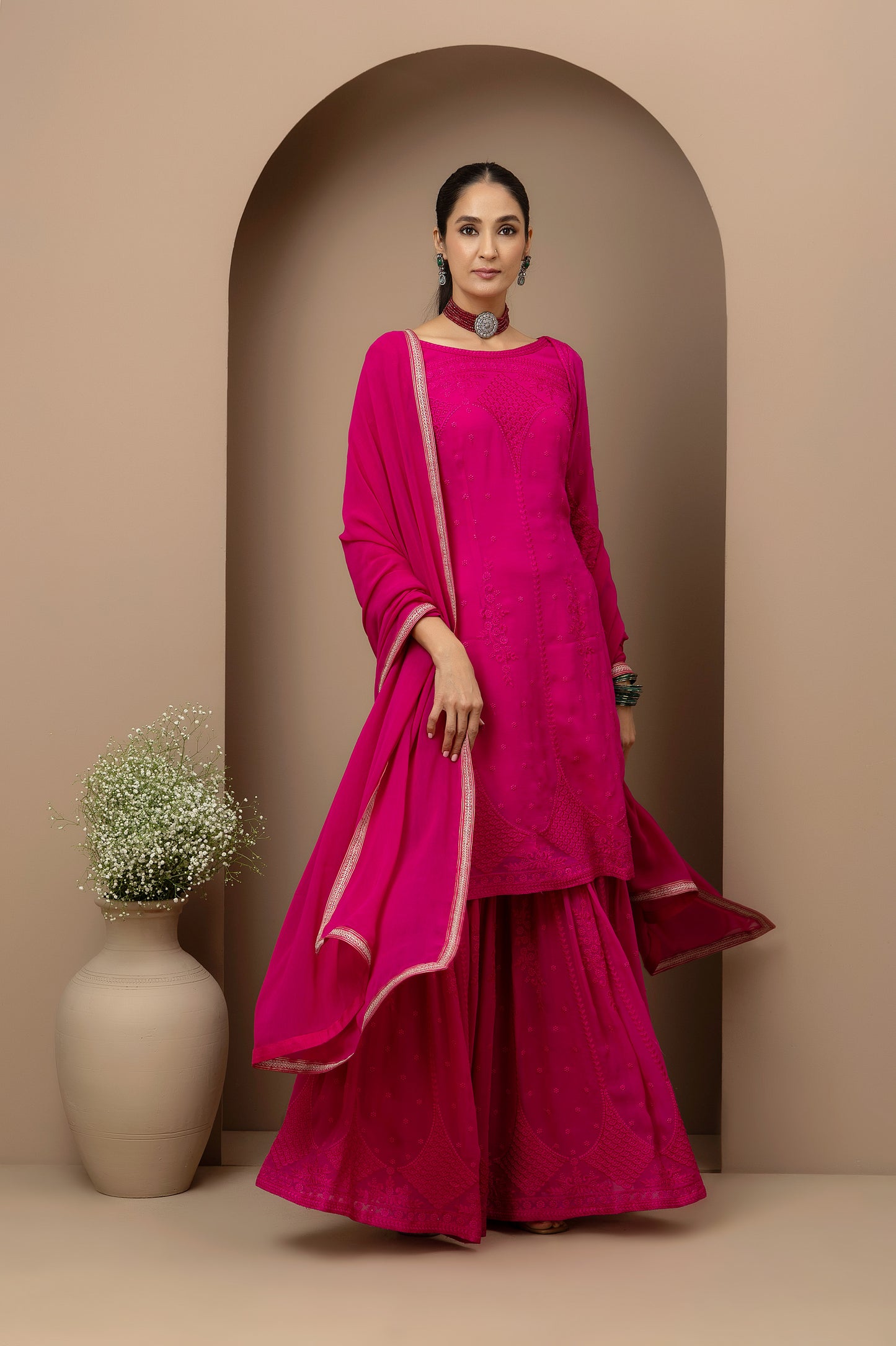 MMD/GUL/110 Boat neck georgette embroidered kurta gharara set paired with georgette dupatta with aari border..