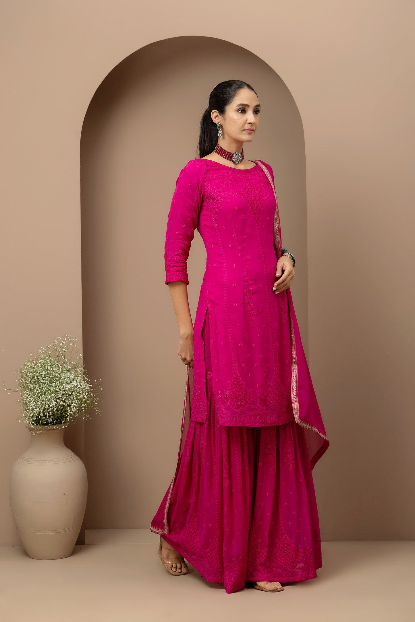 MMD/GUL/110 Boat neck georgette embroidered kurta gharara set paired with georgette dupatta with aari border..