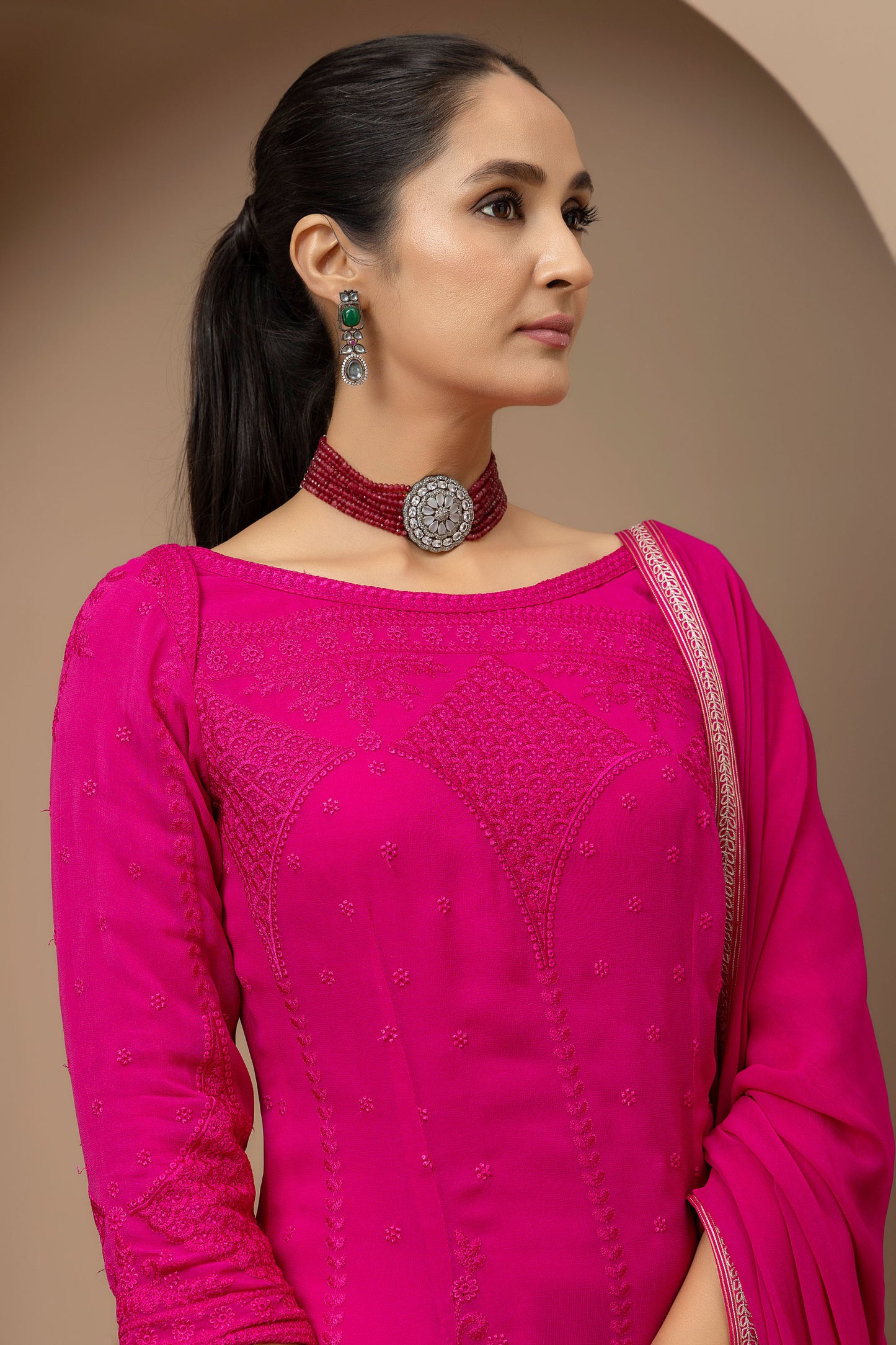 MMD/GUL/110 Boat neck georgette embroidered kurta gharara set paired with georgette dupatta with aari border..