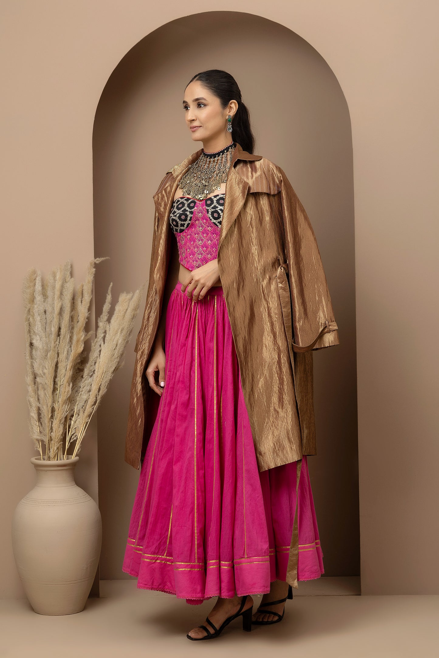 MMD/GUL/113 Aari embroidered corset blouse with mul cotton ghaghra complemented by a gold tissue jacket for a refined contemporary look.