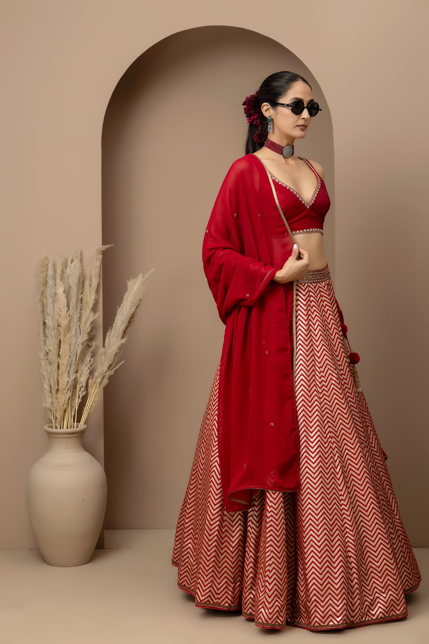 MMD/GUL/115 Silk dupion hand crafted blouse paired with chevron-patterned lehenga and a soft georgette dupatta with chinta.