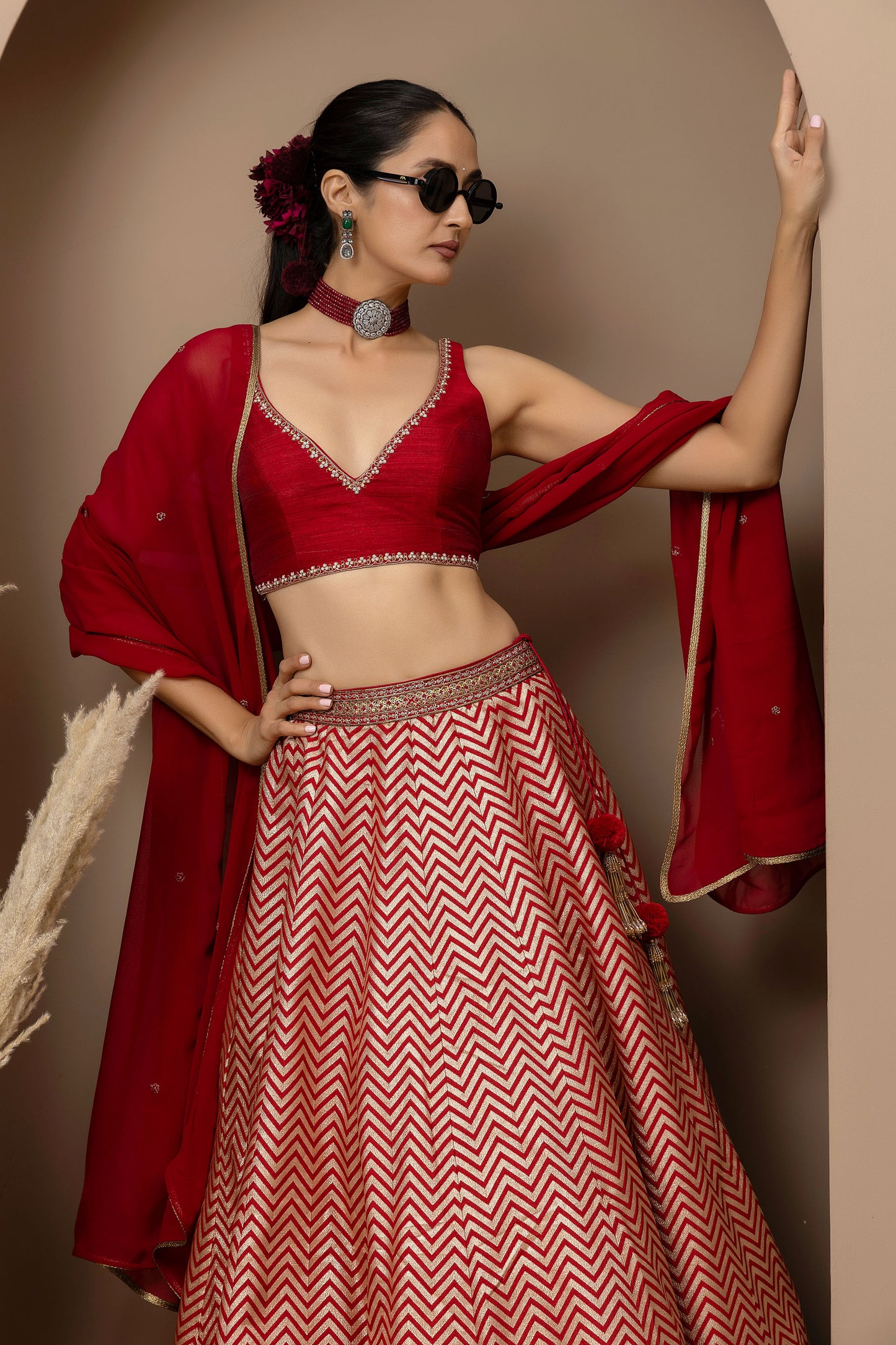 MMD/GUL/115 Silk dupion hand crafted blouse paired with chevron-patterned lehenga and a soft georgette dupatta with chinta.