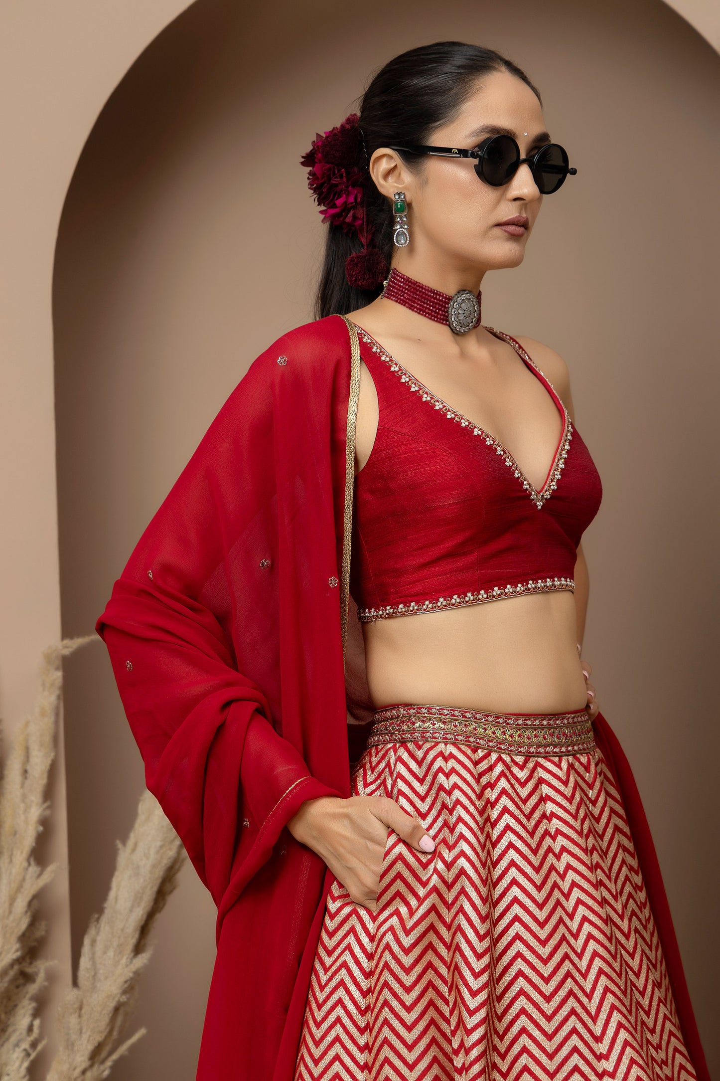 MMD/GUL/115 Silk dupion hand crafted blouse paired with chevron-patterned lehenga and a soft georgette dupatta with chinta.