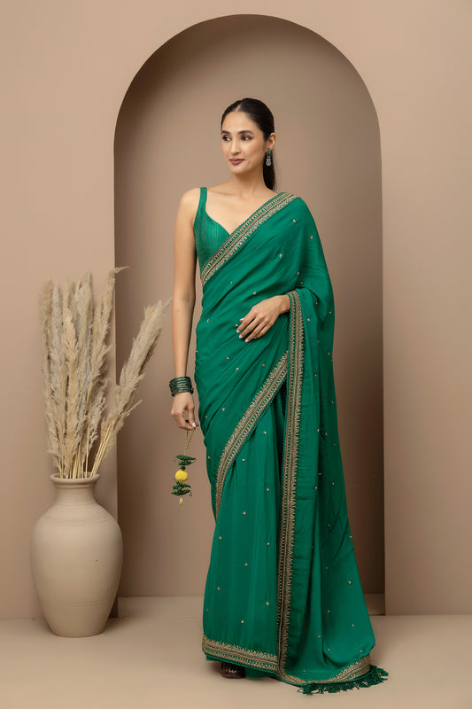 MMD/GUL/116 Crepe saree paired with a tailored silk dupion sweetheart blouse for a refined contemporary look. refined contemporary elegance.