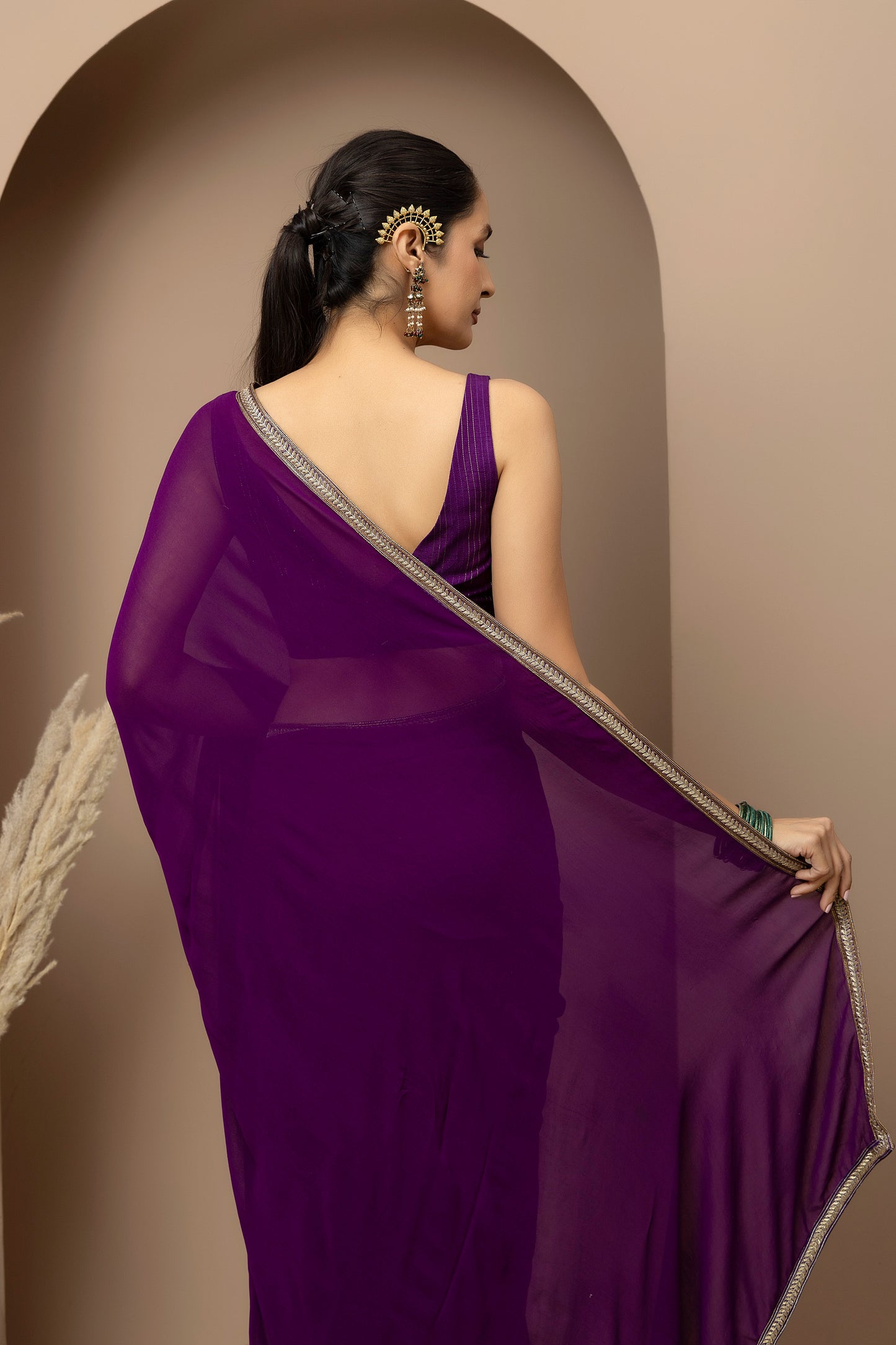 MMD/GUL/117 A soft georgette saree with a handcrafted border, paired with a tailored blouse for refined contemporary elegance.